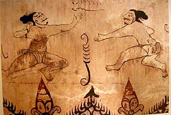 Depiction of two fighters in Subak competition.