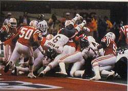 Bears quarterback Jim McMahon scoring one of his two rushing touchdowns in Super Bowl XX.