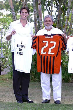 Kaká presenting a Milan jersey to then-Brazilian president Lula in 2007