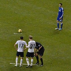 Fàbregas preparing to take a free kick against Tottenham in January 2015
