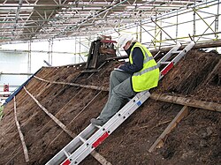 Excavation of the thatch at Moirlanich Longhouse