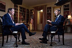 Rose interviews President Barack Obama in 2013.