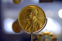 Alexander Fleming's 1945 Nobel Prize medal for Physiology or Medicine on display at the National Museum of Scotland, Edinburgh.