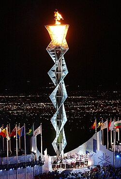 The Olympic cauldron is lit by the 'Miracle on Ice' 1980 U.S. men's ice hockey team at the opening ceremony of the 2002 Winter Olympics in Salt Lake City