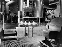 The first light bulbs ever lit by electricity generated by nuclear power at EBR-1 at Argonne National Laboratory-West (now the Idaho National Laboratory), December 20, 1951.[7]
