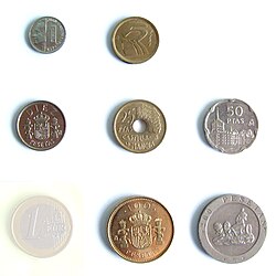 Last editions of peseta coins (lacks Pts 500 coin) and 1-euro coin for size reference.