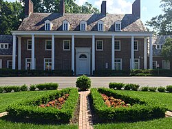 Albemarle, the 1917 estate of pharmaceutical magnate Gerard Lambert, home to the school from 1952 to 2012[10]