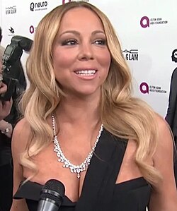 Carey attending Elton John's AIDS Foundation Academy Award Party in February 2016