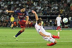 Suárez strikes against Sevilla in the 2015 UEFA Super Cup