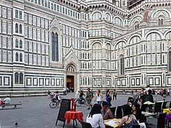 Tourists and restaurant on the Piazza del Duomo
