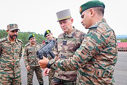 Indian Army showcasing ASMI to French soldier during Exercise Shakti