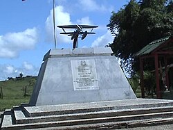 War Memorial in Tarapacá, Colombia. The plaque reads, "To the Heroes of the Colombian Air Force; who with true courage gave the best of themselves; flying with their noble aircraft over river and jungle. Declaring over our Amazonia with the sound of their motors the sovereignty of our country during the war with Peru."