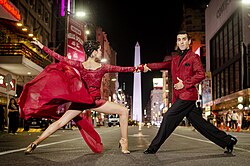 Tango Porteño. Two Argentine tango street dancers in Corrientes street, Buenos Aires, 2020.