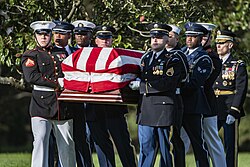 Powell's coffin is carried by an Armed Forces body bearer team at his funeral on November 5, 2021.