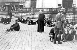 Polish priest and other Polish civilians as German hostages awaiting execution in Bydgoszcz, Poland, September 1939