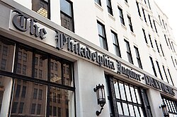 The sign above the entrance to Inquirer Building